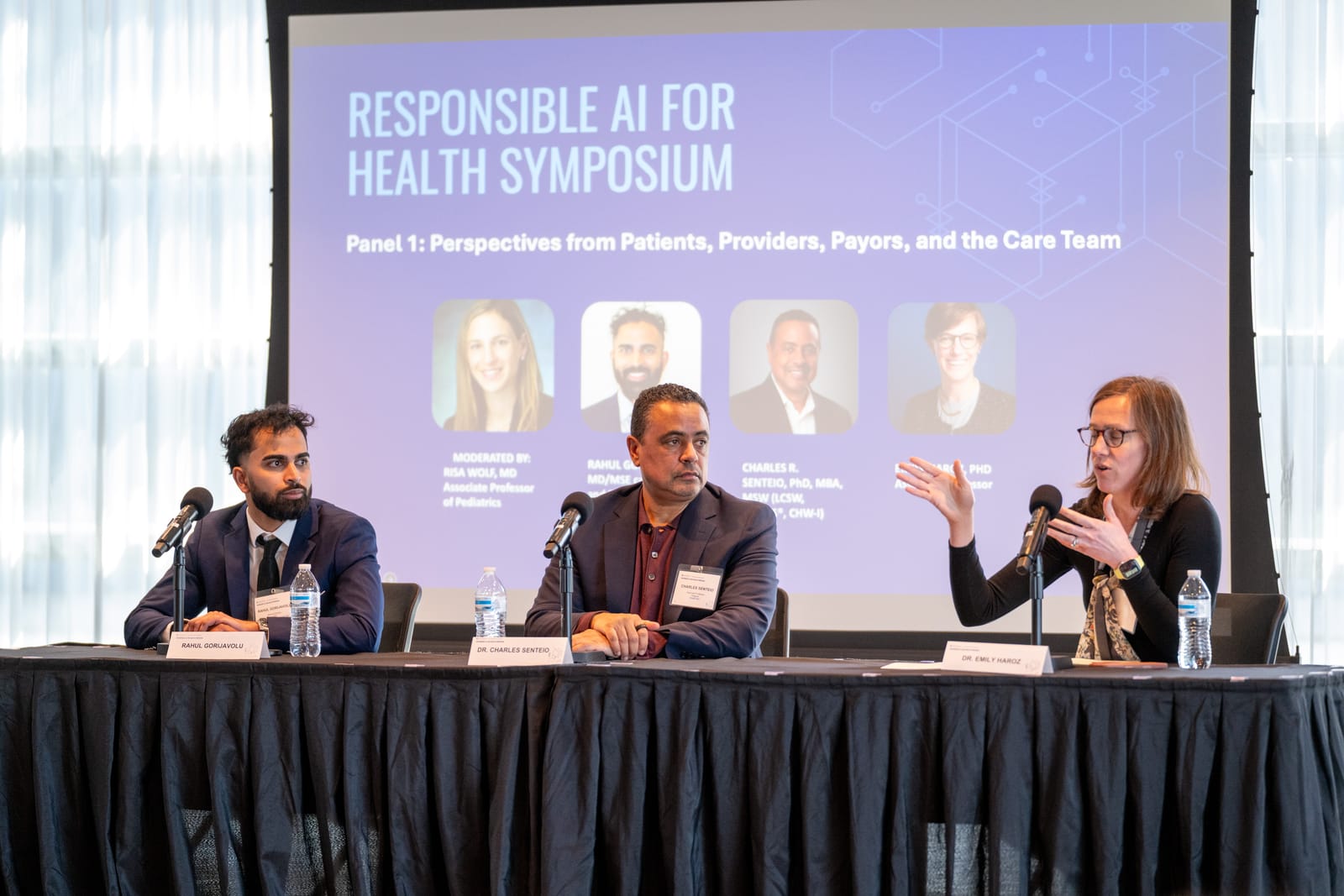 Panelists speak on stage at the Responsible AI for Health Symposium, Panel 1: Perspectives from Patients, Providers, Payors, and the Care Team.